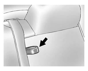 3-8 Seats and Restraints 3. Lower the seatback by pulling forward on the tab on the outboard side of the rear seatback.