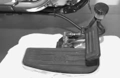 Right-Hand Footrest Removal: Disconnect and remove the brake light switch.