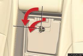Unlock the armrest door using the mechanical key.