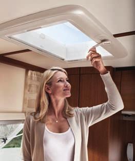 42 for motorhomes and caravans: with pleated, black gauze fly screen and two integrated lights for