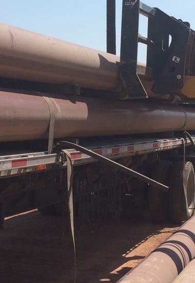 3.5 in. heavy wall pipe or square tubing, extending above the deck of the trailer.