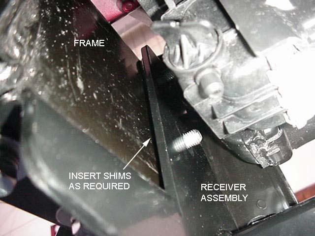 outside of the frame tube. See Figure 7. Insert Shims between the Receiver Assembly and the bumper brackets as required Do not tighten at this time. 11.