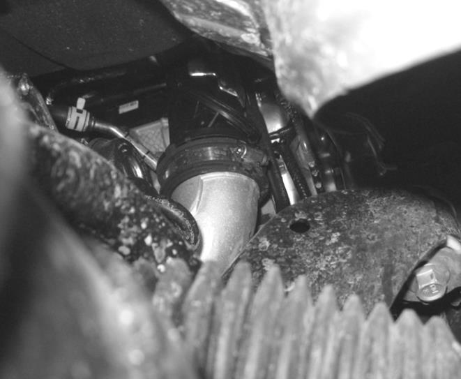 Undo the clamp at the turbo end of the clean air tube (7mm) and remove the clean air tube from the vehicle.
