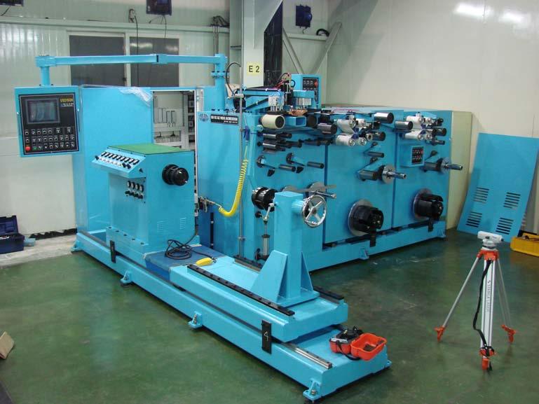 Foil Winding Machine { UF(X) 150H TYPE } [ Cast resin, Molded transformer ] Description The machine has an automatic electronic Foil & Strip layering system for high voltage of cast resin transformer.