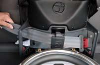 Pull on the shoulder portion of the vehicle seat belt to tighten the lap portion on the belt path (Photo I). 13.