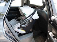 The bottom edge of the car seat should be between 10 degrees tipped back and horizontal after installation. A towel underneath one end of the car seat may be required to accomplish this (Photo B).
