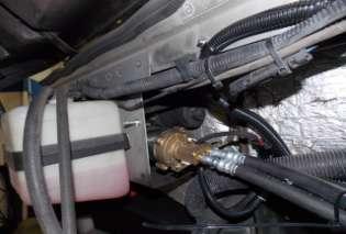 UXILIRY FUEL PUMP 50) THE HOSE FITTING WITH 3/4" CROWFOOT ND WRENCH TO 18 Nm +/- 1.