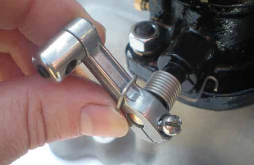b) Use a small school protractor or angle finder to set the lever to 40 degrees before the vertical. (See Picture 2) Tighten the countersunk lever clamping screw with a long, flat blade screwdriver.