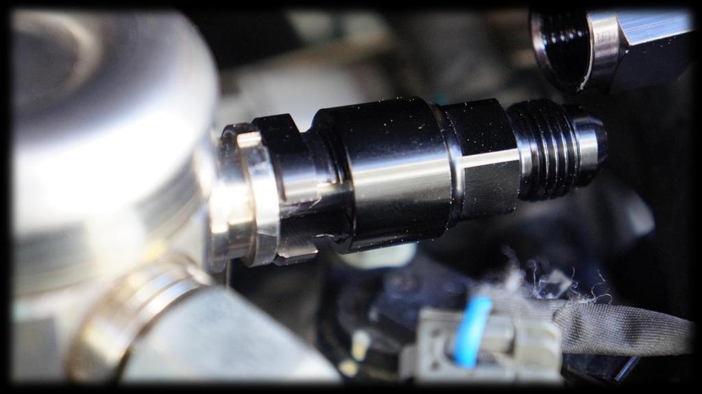 13. After removing the threaded cap, install it on the inlet of the High Pressure Fuel Pump as shown.