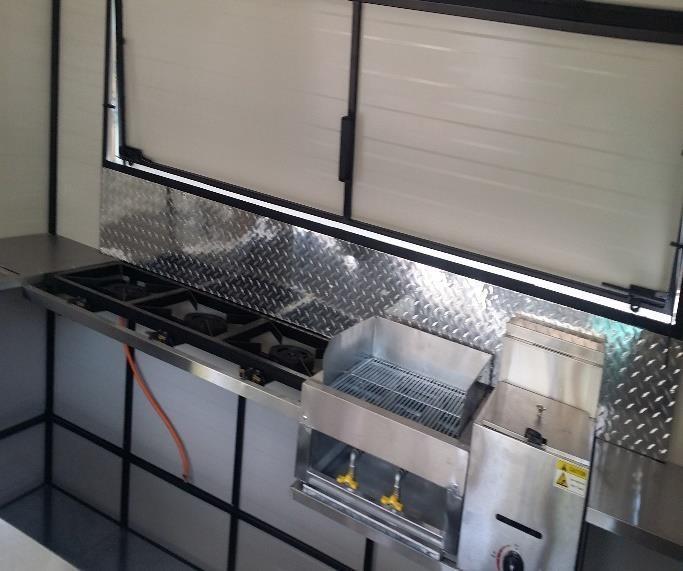 Self-ignite Single chips fryer 7. Stainless steel Preparation table 8. Lockable Gas Bottle Cage 9. Two serving hatches 10.