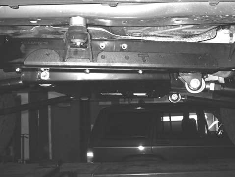 Attach your new Belly Up skid plate to the frame by aligning the transmission bolts with the holes in the skid plate and then bolting the skid plate to the frame using the six factory skid plate