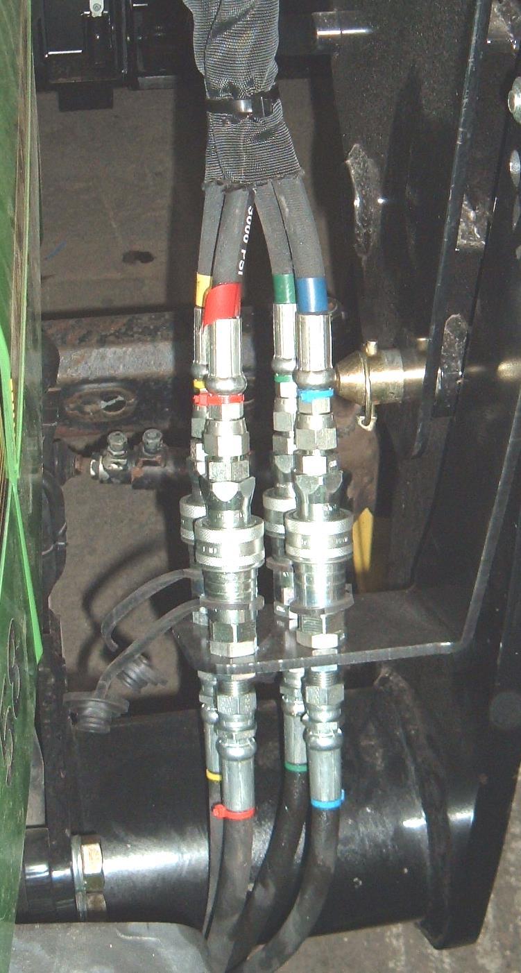 6.4.7. Quick connect loader hoses to hydraulic circuit of tractor previously installed per instructions with Hydraulic Kit installed. 6.4.8.