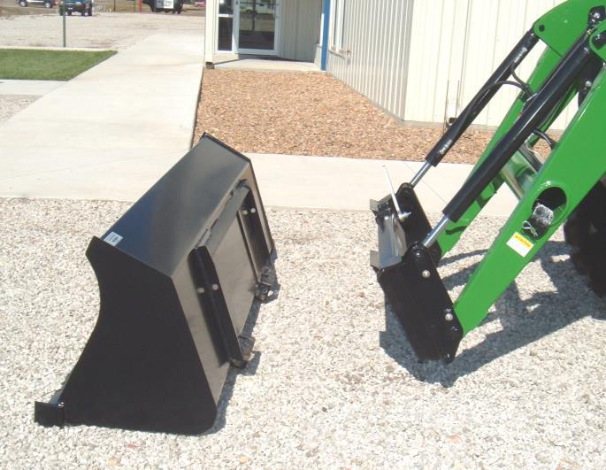 12. SKID STEER TOOL CARRIER SYSTEM IMPORTANT: Read safety information in this section and on decal before operating attachment.