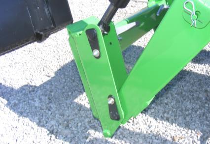 13. INSTALLATION & OPERATION OF SKID STEER TOOL CARRIER SYSTEM IMPORTANT: Read safety information in this section and on decal before operating attachment.