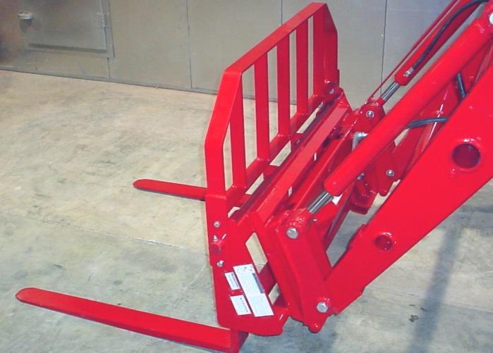 WARNING: The pallet fork attachment is specifically designed to engage and load palleted