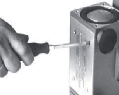 Perform the same procedure for the lower connector. Unscrew and disassemble the connectors and their washers.