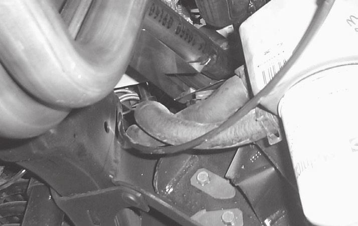 Figure 4 20. Make sure the O-ring is on the dipstick tube, and reinstall it into the hole in the engine block. Reattach the dipstick tube bracket to the cylinder head with the factory hardware. 21.