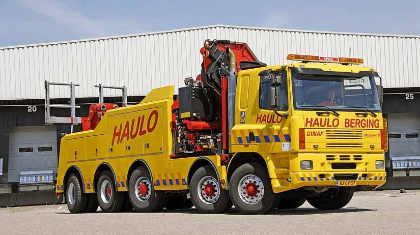Specialist truck builder GINAF is best known for using DAF cabs, engines and axles on its 10x8 dump trucks, so this huge recovery truck with four steering axles is something of a monster.