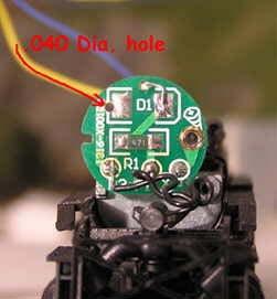 Insert bent end of white decoder lead into hole in top of circuit board and solder to right hand D1 pad. Drill.040 Diameter hole in left D1 pad. Cut blue decoder lead to 3".