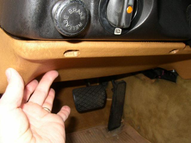 Remove the hush panel under the driver s side dash.