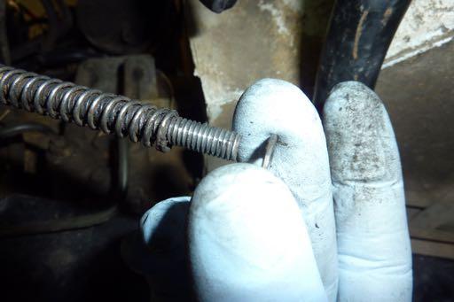 Step 5 Remove the clutch cable from the clutch lever and remove the spring and both