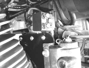Following the procedures in your authorizes shop manual, remove the ignition coil. Photo 3A 6A.