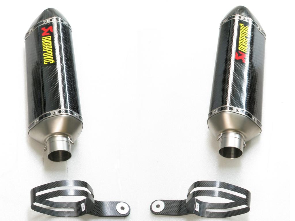 Correctly position the carbon fiber clamps and slide them onto the mufflers - bear in mind the left offset of the carbon fiber clamp viewed from the rear for