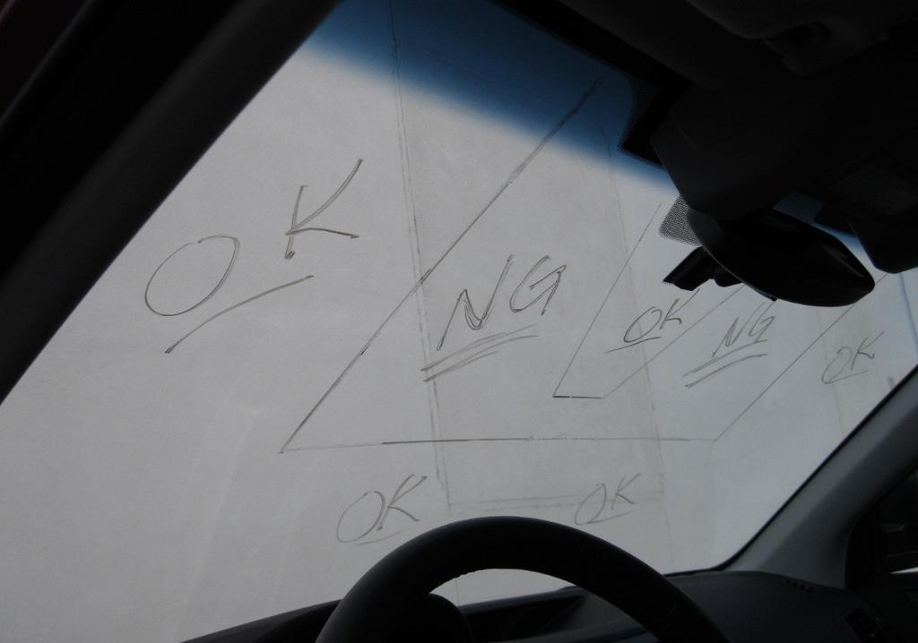 measurements as a guide to complete the prohibited NG and acceptable OK areas for windshield repairs.