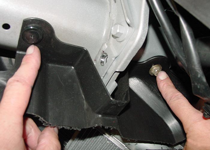 Remove eight plastic fasteners from the air intake