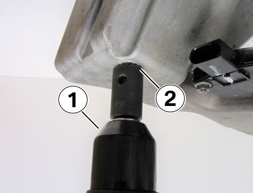 Step 21: Install the re-facing tool into a drill (1).