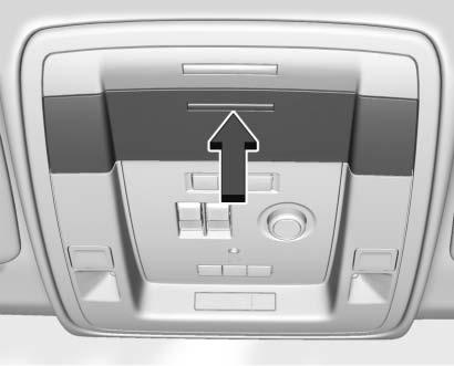 If the cupholder door is closed, it will lock if the vehicle is in a crash. See your dealer to have the door unlocked. Press the button on the forward bin to open.