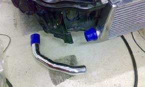 Install the lower intercooler pipe and connect to the HDi intercooler with