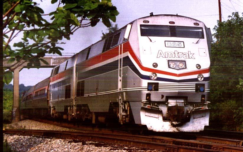 This pair of AMD-103 s was photographed outside of Woodbridge, VA, pulling a 38 car Autotrain to sunny Florida.