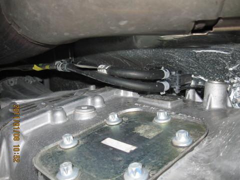 6. If you haven t deleted the DPF yet, remove the two rubber hoses on the passenger side of the transmission that go to the exhaust pressure sensor. 7.