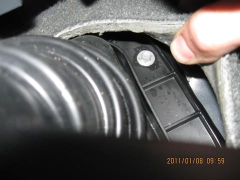 3. Remove the 6 screws holding the inner shifter boot to the transmission hump.