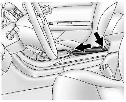 4-2 Storage Cupholders Center Console To reinstall, place the two forward tabs into the slots and
