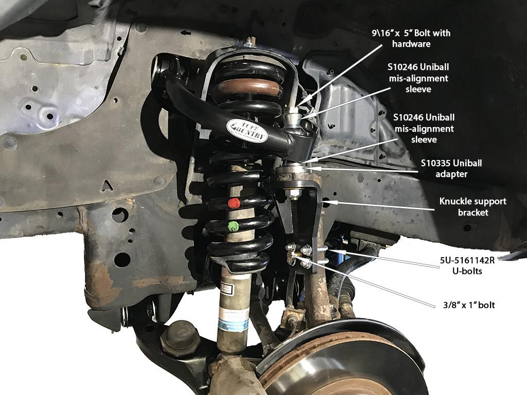 24. At this time, using a grease gun, apply grease to the 4 grease fittings located at each upper control arm eyelet. We recommend greasing until you start to see greas squeeze out of the bushings.