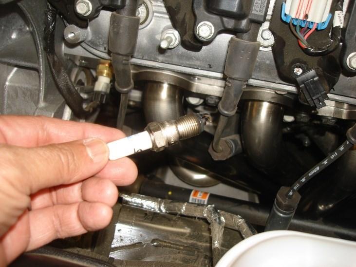 Borla Performance Stainless Steel Long Tube Header System Installation 6. Install dip stick using original hardware. (See Fig. 18) 7. Install and tighten spark plugs. (See Fig. 19) 8.
