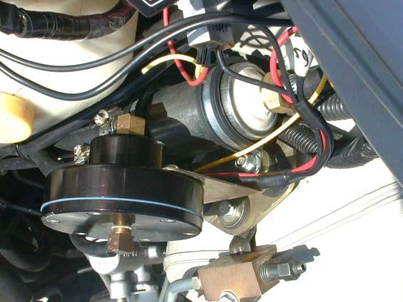 32. Attach fuel lines. NOTE: Use 5/16 ID HIGH PRESSURE FUEL LINES with the 9- #4 hose clamps, cut to 4 different length as shown in PHOTO # 12.