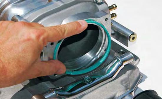 Install the throttle body O-ring into the inlet