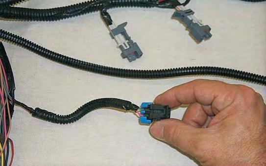 180. Locate the Purge solenoid connector branch on the main branch of the harness.