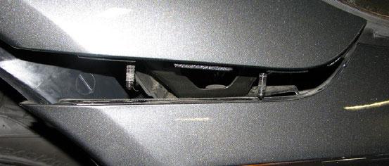 fascia directly below the hood to protect from damage during removal. 16.