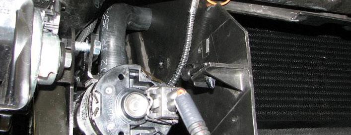 149. Install the short molded hose from the outlet of the intercooler
