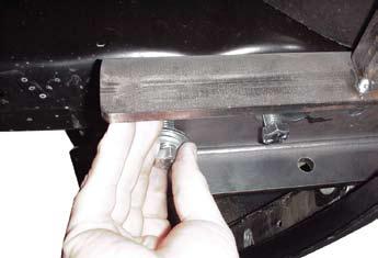 aptor only: remove metal skid plate front bracket on each side by removing