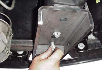 9. einstall factory bolt into rear tow hook hole in frame.