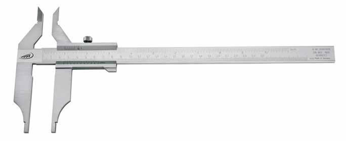 0265 Caliper with cross points 1 Reading parts have a satin chrome finish Wooden case Measuring range Length of cross points Jaw