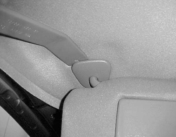Carefully store overhead console bezel on a clean, padded surface. Fig. A-3 B.
