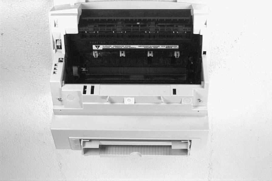 Main Cover and Paper Input Assembly Remove the toner cartridge. Remove memory door (HP LaserJet 5L and 6L). CAUTION Remove the memory door first (HP LaserJet 5L and 6L).