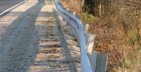 Figure 59. Guardrail with rail and post deflection The amount of deflection that can be sustained by guardrail before its safety is compromised is a major concern.