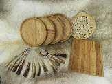 These sets consists of: oak wood plates; natural antler handle spoons, knives and forks; elm wood bowls,